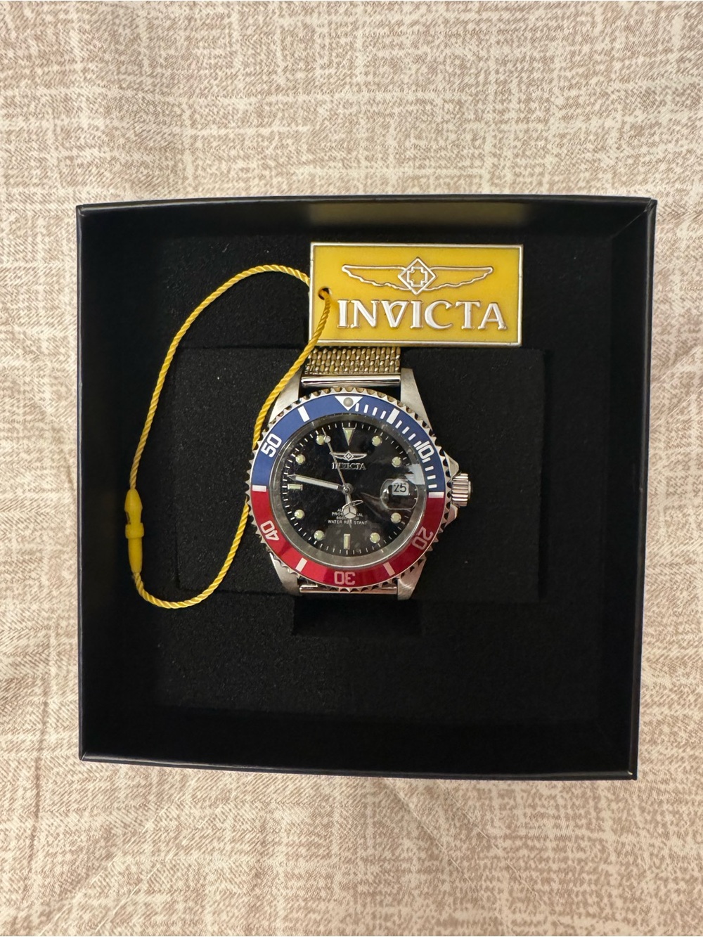 Invicta Men's Watch with Blue & Red Bezel and Black Dial